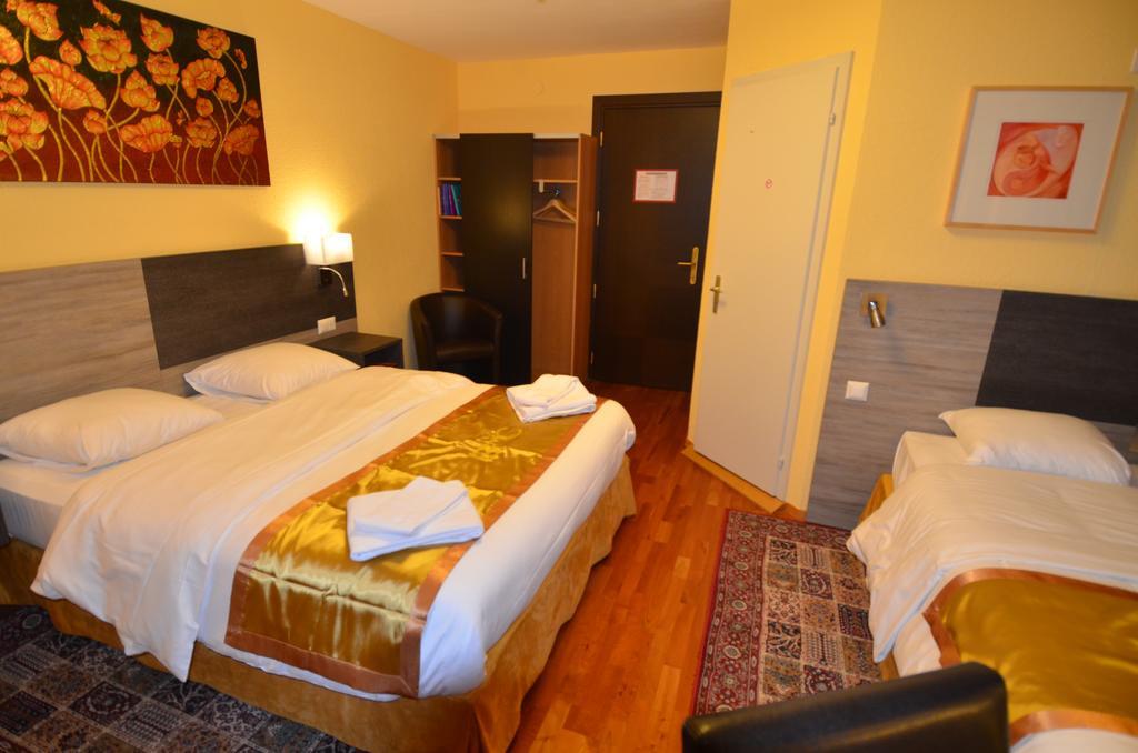 Beausite Hotell Crissier Rom bilde