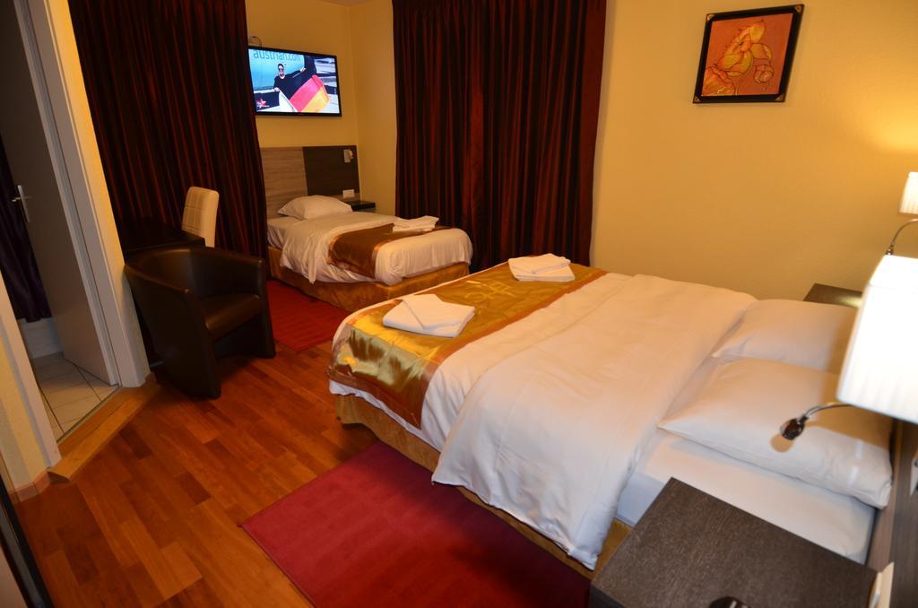 Beausite Hotell Crissier Rom bilde